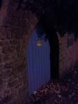 a blue gate in the twilight